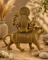 BRASS DURGA IDOL SITTING ON LION