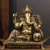 Brass Ganesh Resting On Chowki Sculptures