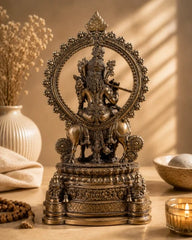 Brass Lord Krishna with Cow on Grand Kirtimukha Pedestal with Twin Peacock Lamps