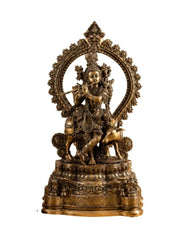 Brass Lord Krishna with Cow on Grand Kirtimukha Pedestal with Twin Peacock Lamps