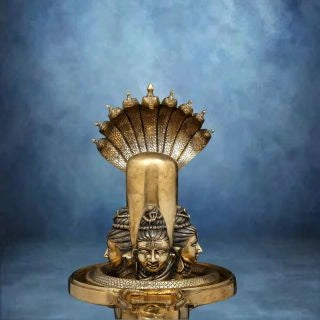 Brass-Shivalingam-with-Four-Shiva-Faces-and-Nine-Hooded-Serpent-Protection-4