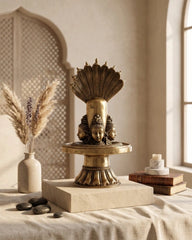Brass Shivalingam with Four Shiva Faces and Nine Hooded Serpent Protection