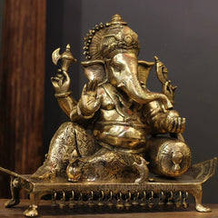 Brass Ganesh Resting On Chowki Sculptures