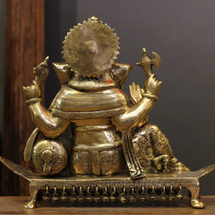 Brass Ganesh Resting On Chowki Sculptures