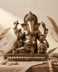 Brass Ganesh Resting On Chowki Sculptures