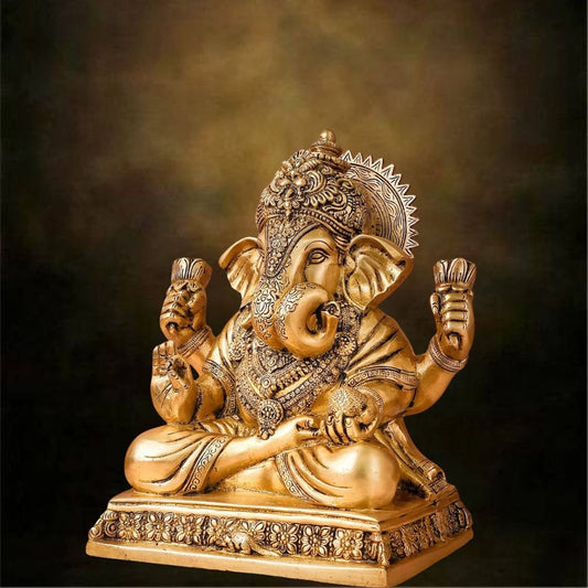 Brass Lord ganesha sitting on Chowki