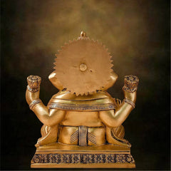 Brass Lord ganesha sitting on Chowki