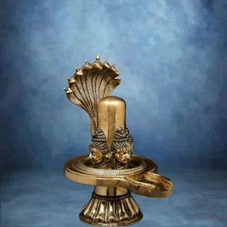 Brass-Shivalingam-with-Four-Shiva-Faces-and-Nine-Hooded-Serpent-Protection-1