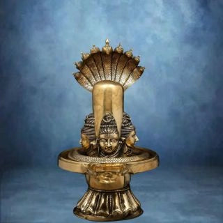 Brass-Shivalingam-with-Four-Shiva-Faces-and-Nine-Hooded-Serpent-Protection-3