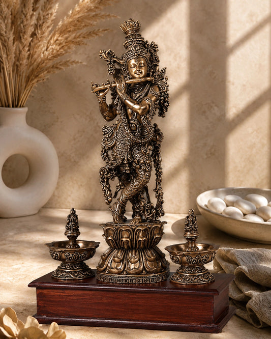 Brass Superfine Lord Krishna Idol with Twin Lakshmi Diyas on Wooden Base