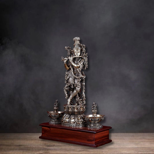 Brass Superfine Lord Krishna Idol with Twin Lakshmi Diyas on Wooden Base