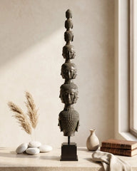 Tower of Tranquility: Buddha Heads - Bronze Sculpture