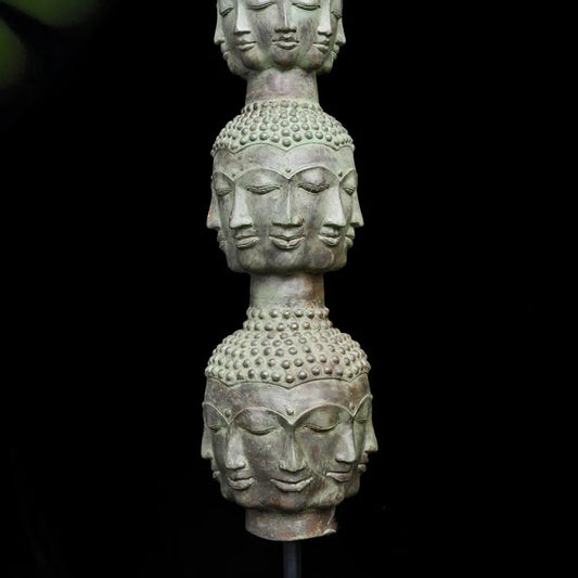 Tower of Tranquility: Buddha Heads - Bronze Sculpture