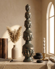 Tower of Tranquility: Buddha Heads - Bronze Sculpture